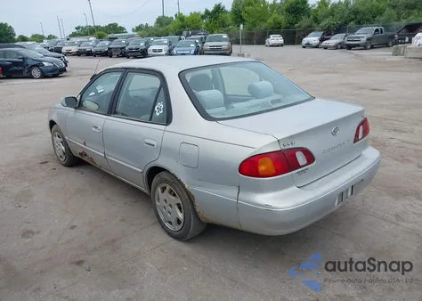 1999 Toyota Corolla Le from USA, damaged, VIN 2T1BR12E7XC154444